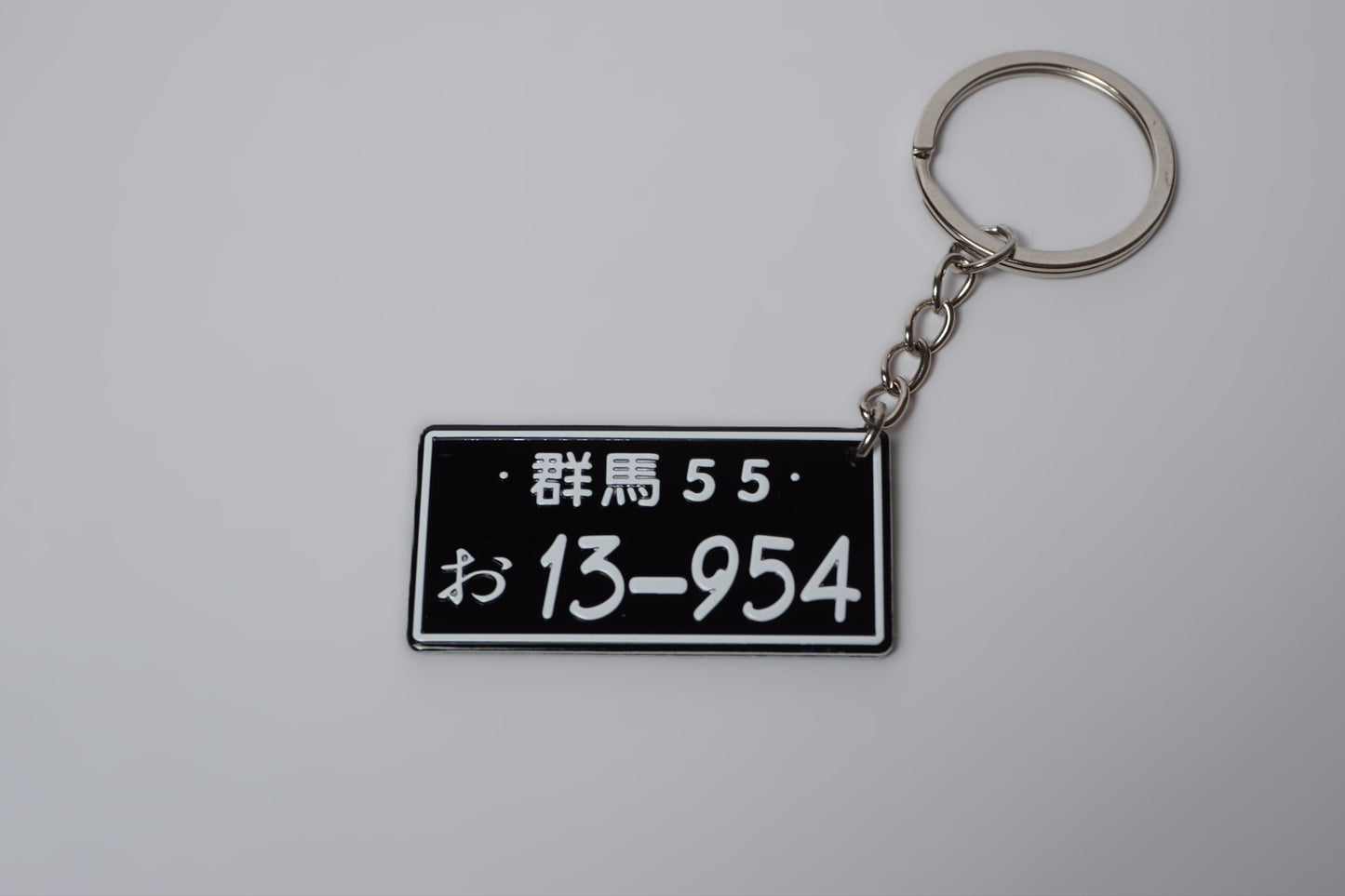 Japanese License Plate Keychain – Black & White JDM Style Car Accessory